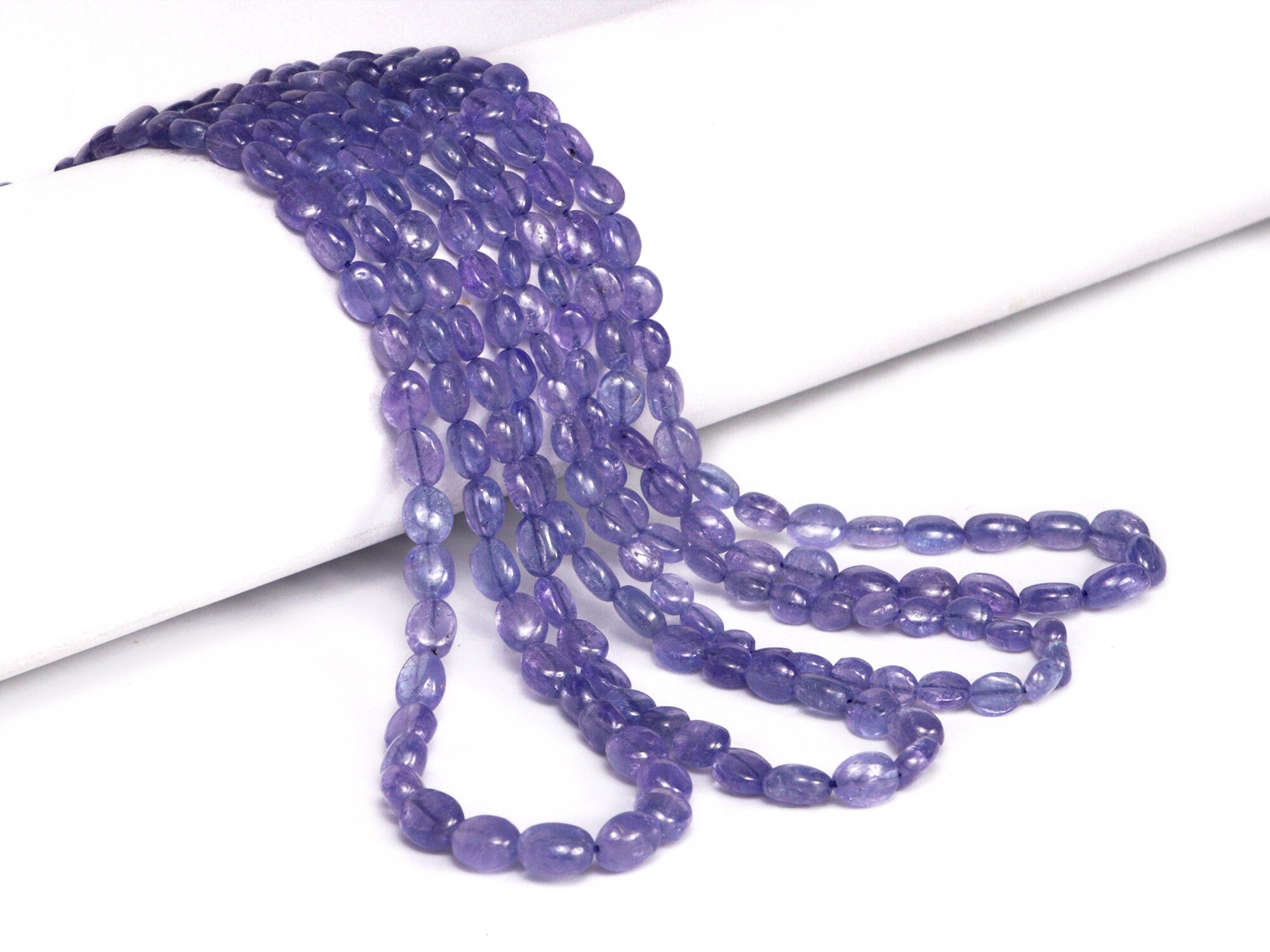 AA Quality Tanzanite Smooth Oval Beads, 4x5 mm - 5.5x7.5 mm, SKU2044