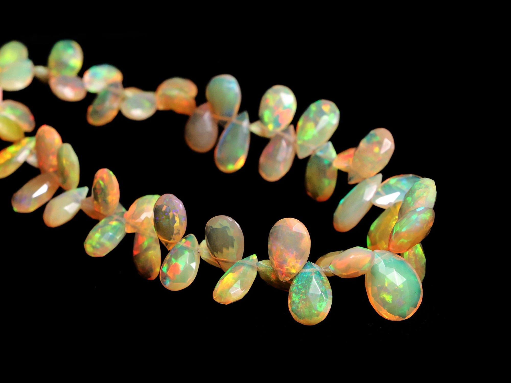 AA Quality Ethiopian Welo Opal Side Drill Faceted Pear Beads, SKU2119