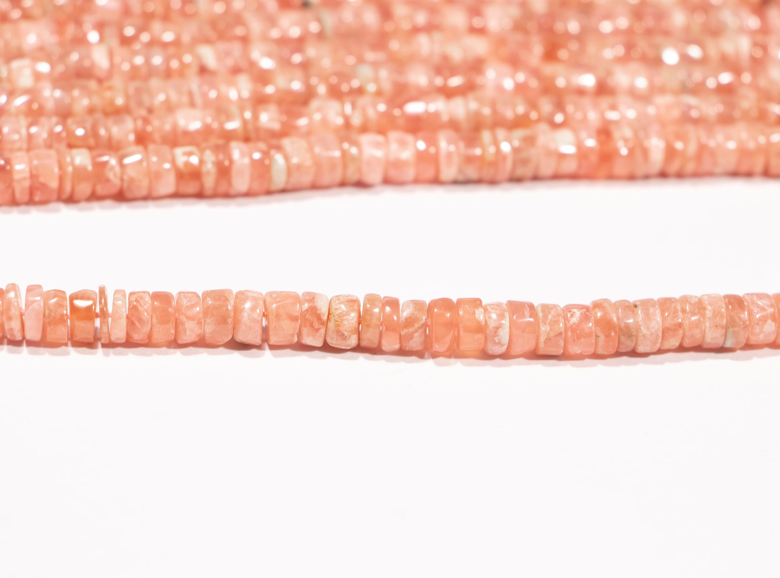 AA Quality Rhodochrosite Smooth Tyre Beads, SKU2241