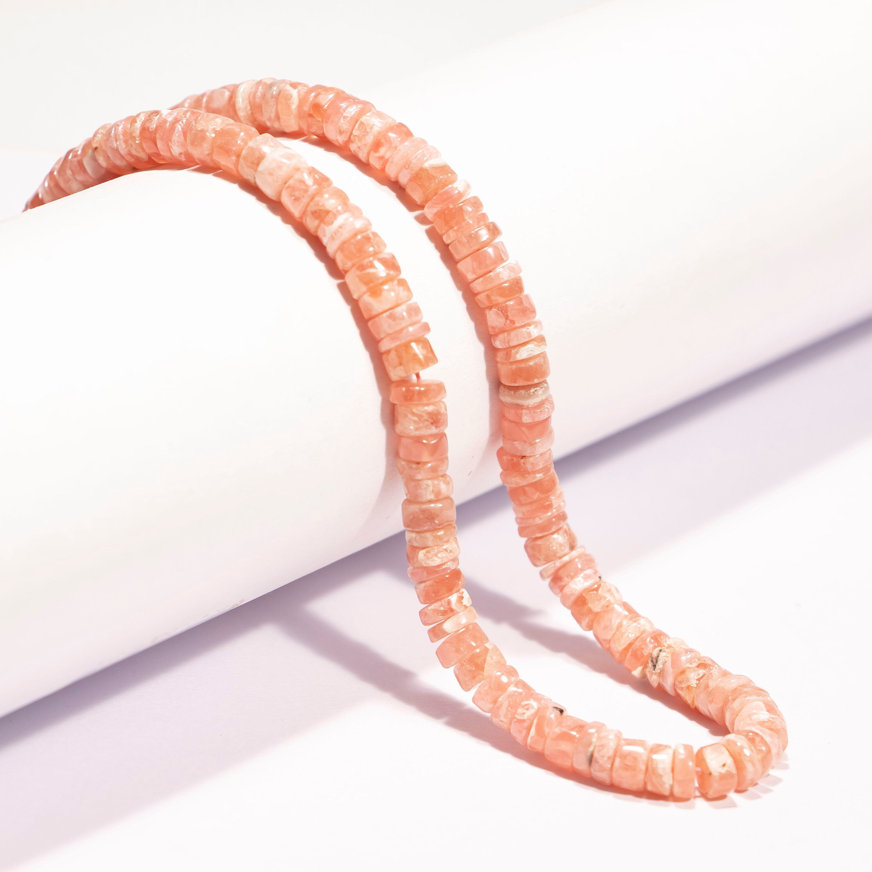 AA Quality Rhodochrosite Smooth Tyre Beads, SKU2241