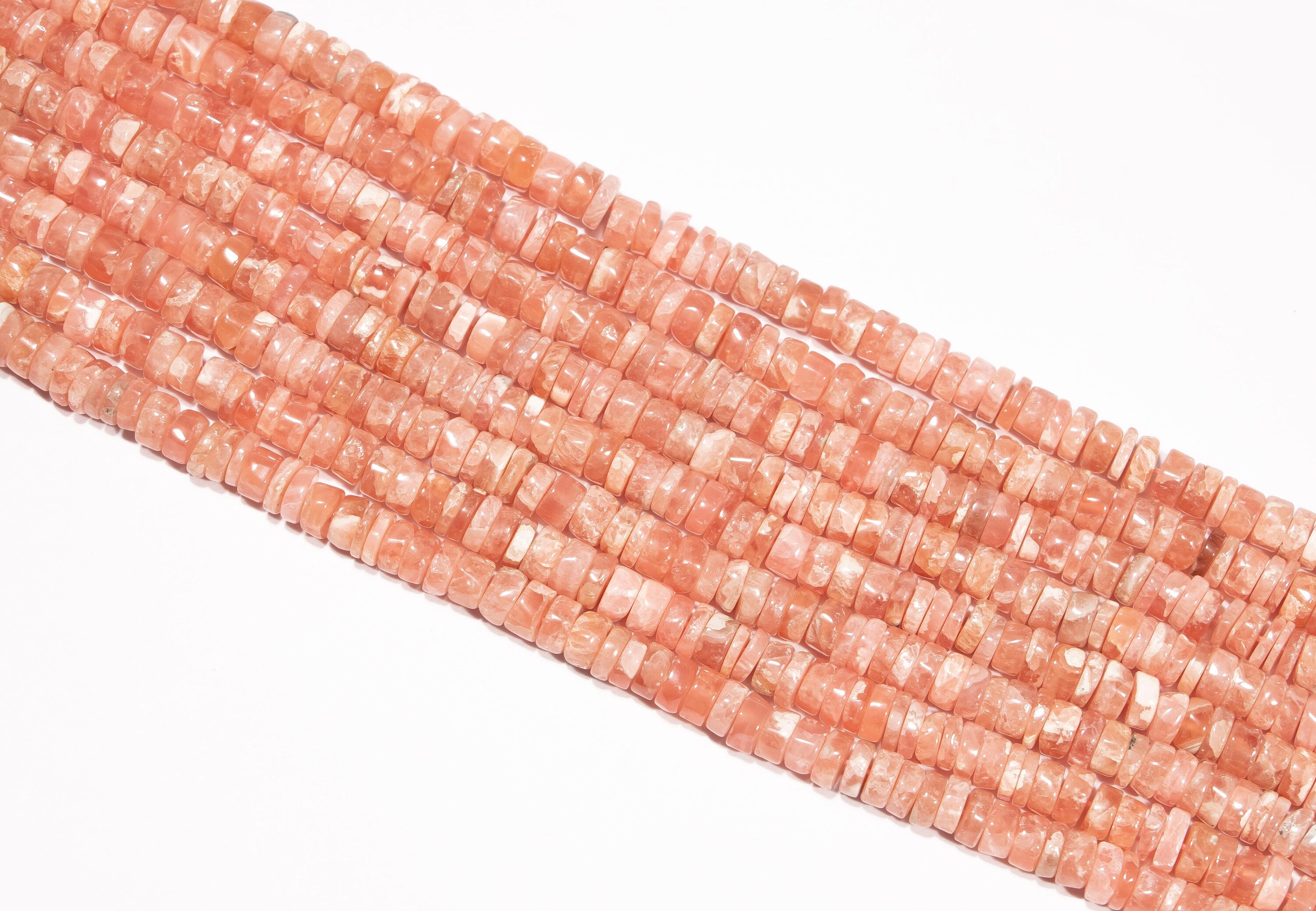 AA Quality Rhodochrosite Smooth Tyre Beads, SKU2241