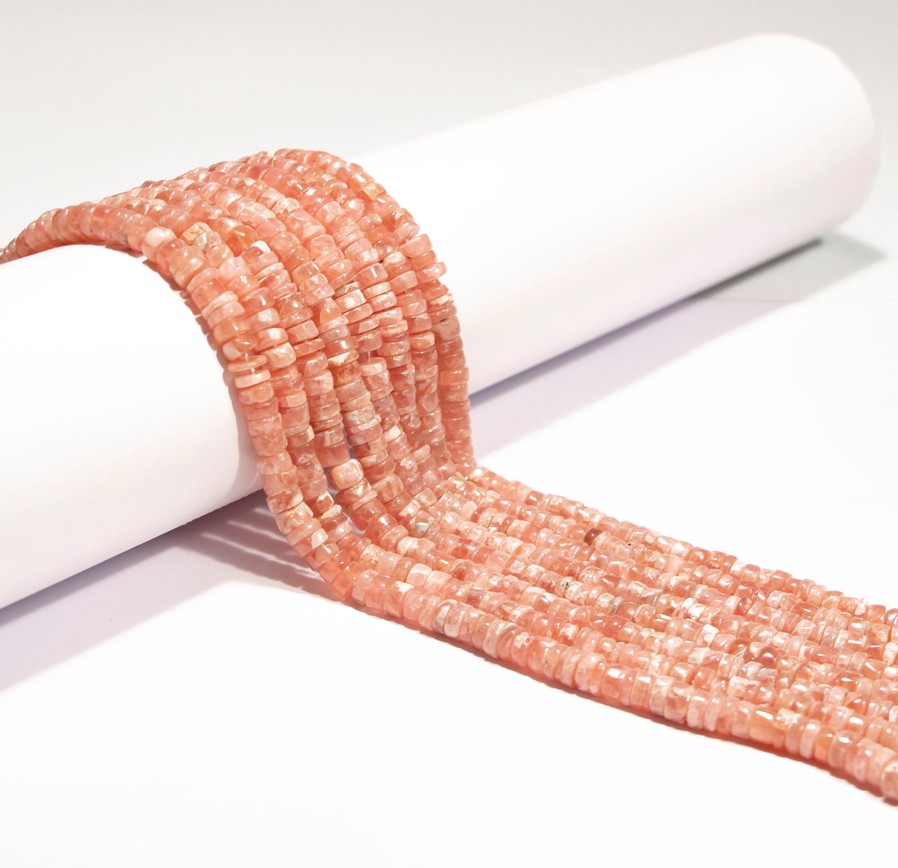 AA Quality Rhodochrosite Smooth Tyre Beads, SKU2241